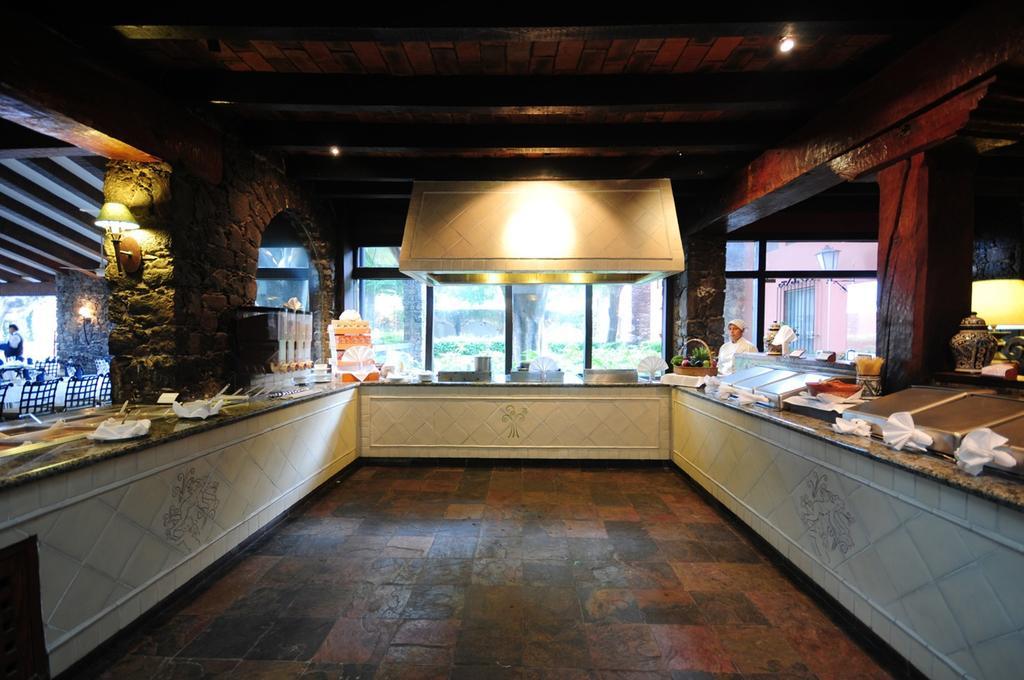 Hacienda Jurica By Brisas Hotel Queretaro Ngoại thất bức ảnh The open kitchen at the restaurant